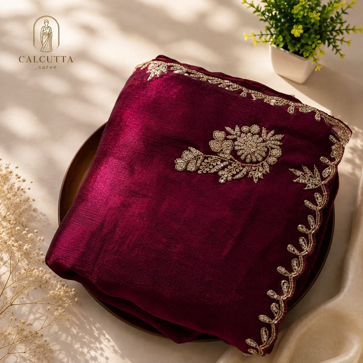 Deep wine embellished saree